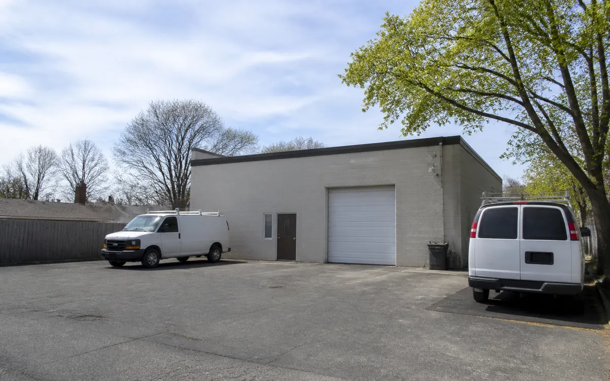A Long Island shop and work vans of the kind LI B2B builds systems for